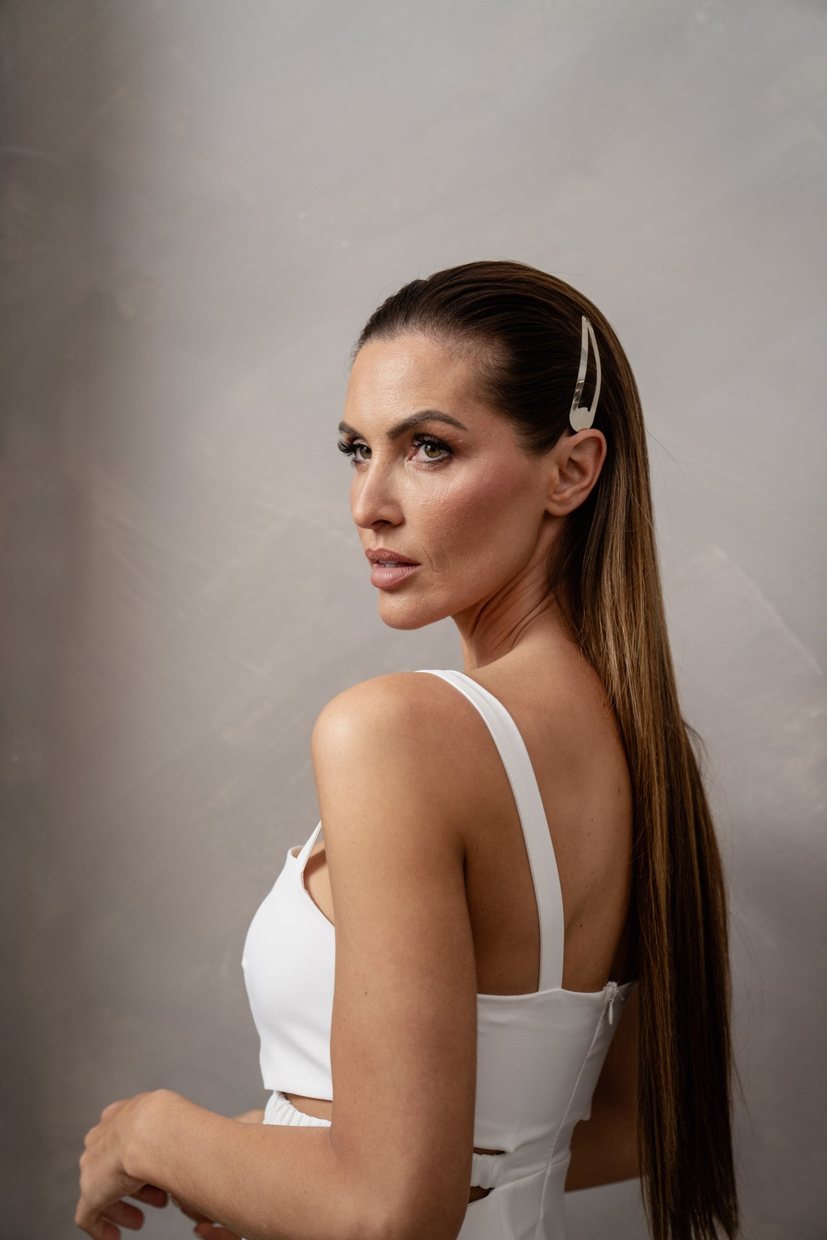 Sleek, straightened hair styled with heat protection